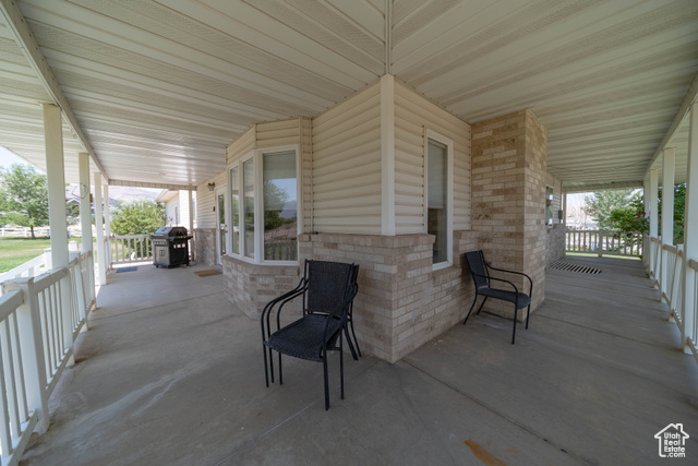 190 600 North Ferron, UT 84523 - Photo 62 of 85 Covered porch with area for grilling, relaxing and enjoying the view