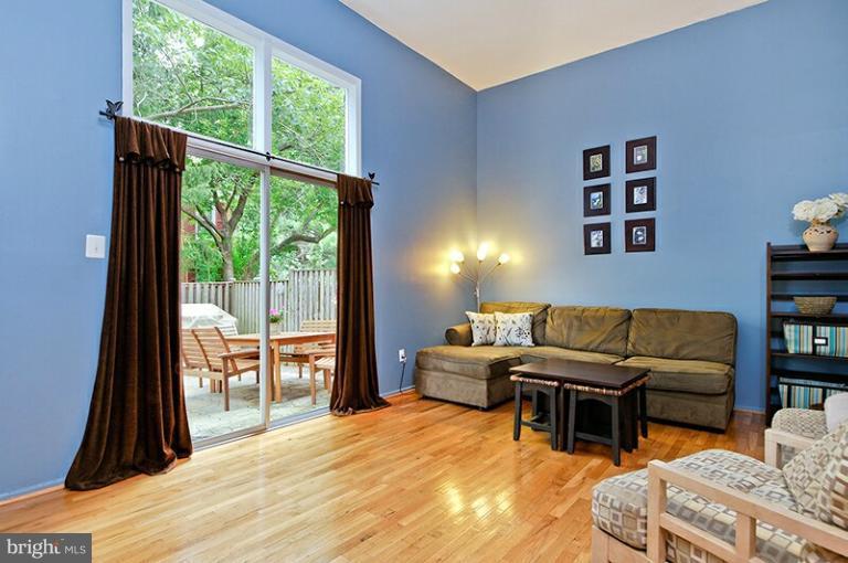 11876 Dunlop Court Reston, VA 20191 - Photo 5 of 25 Living Room with soaring ceiling and patio view