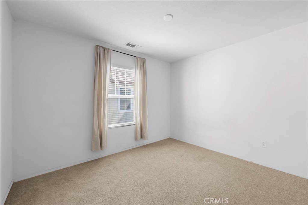 10375 Church, Unit 124 Rancho Cucamonga, CA 91730 - Photo 17 of 34 a view of empty room with window