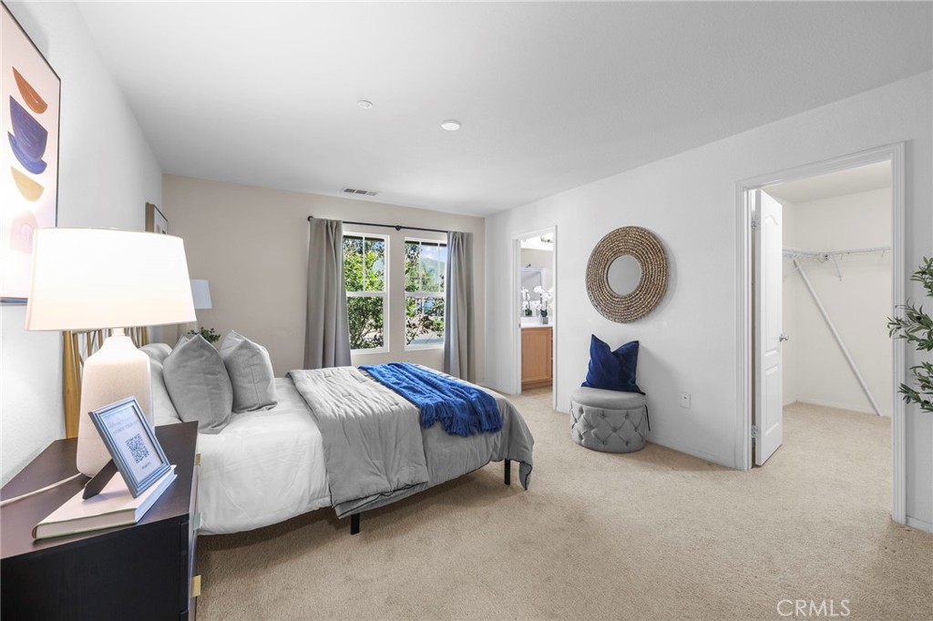10375 Church, Unit 124 Rancho Cucamonga, CA 91730 - Photo 20 of 34 a spacious bedroom with a bed and window