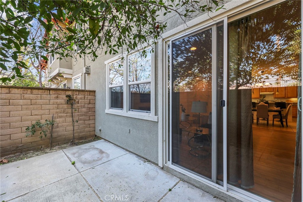 10375 Church, Unit 124 Rancho Cucamonga, CA 91730 - Photo 25 of 34 a view of a porch with a tree