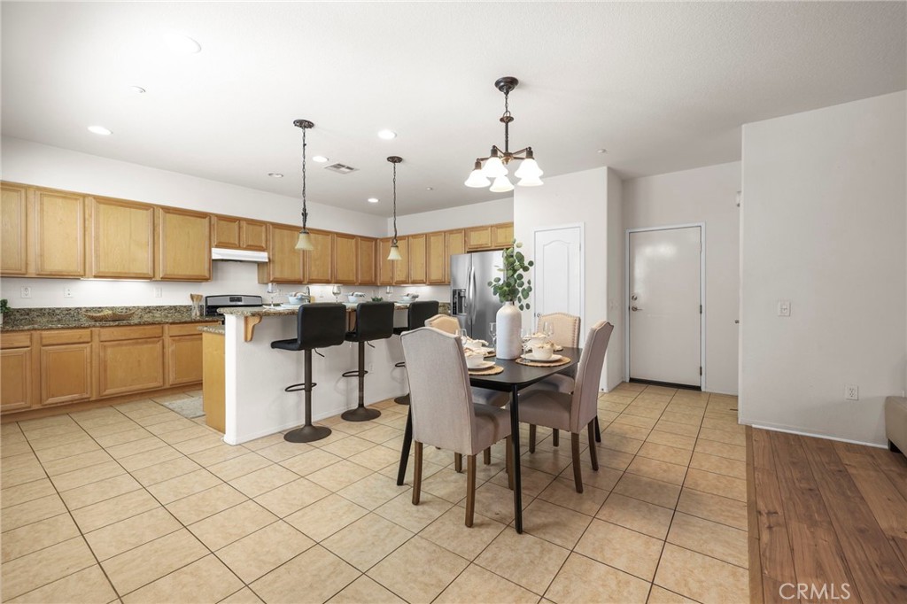 10375 Church, Unit 124 Rancho Cucamonga, CA 91730 - Photo 10 of 34 a kitchen with a sink cabinets and window