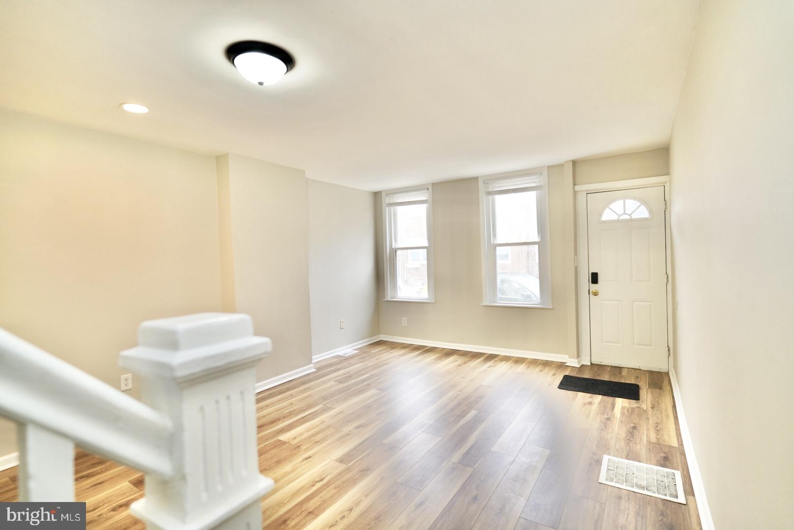 2655 Cedar Street Philadelphia, PA 19125 - Photo 8 of 22 a view of an empty room with a window