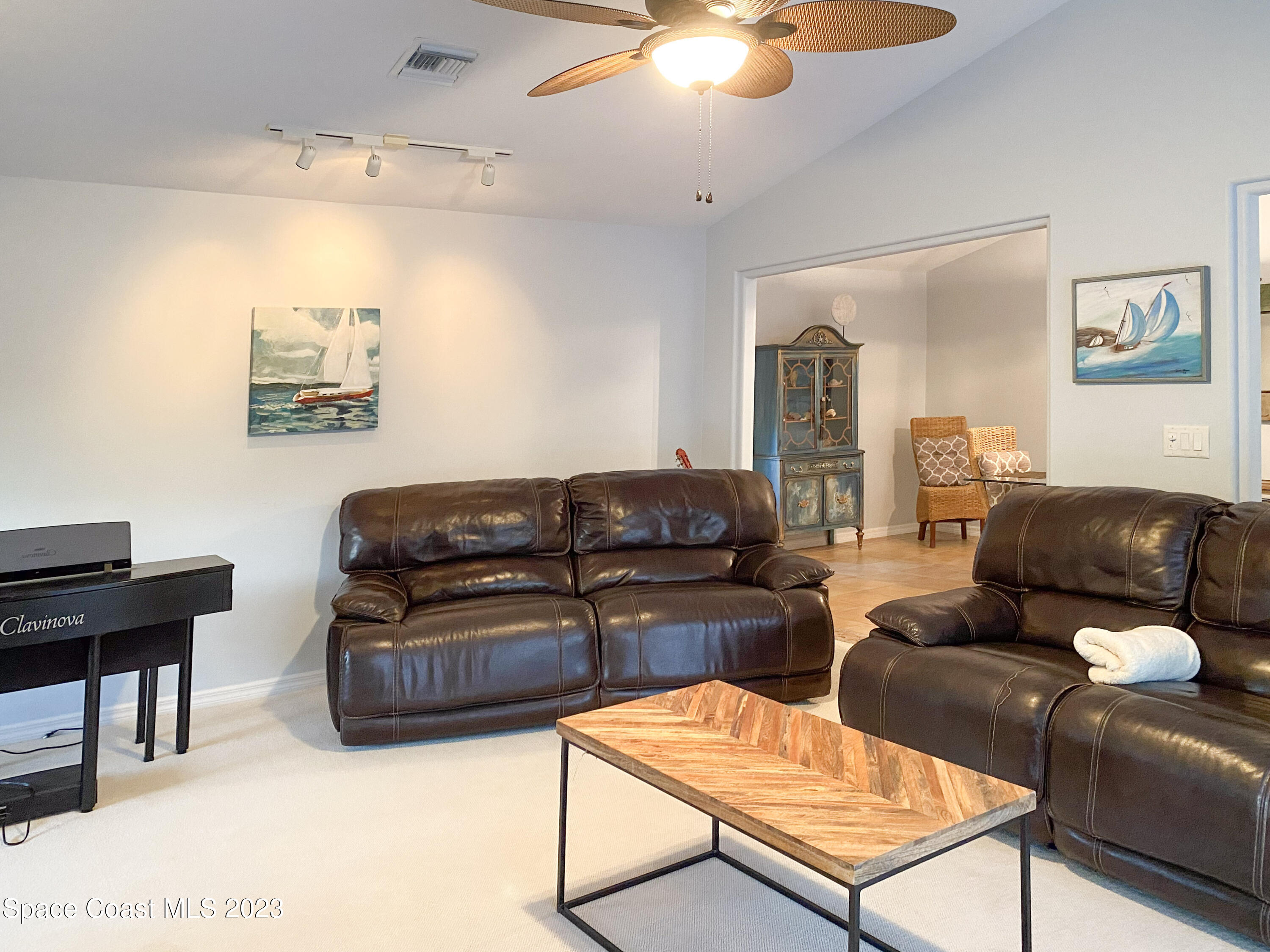 5080 Seiler Street Melbourne Beach, FL 32951 - Photo 11 of 34 a living room with furniture