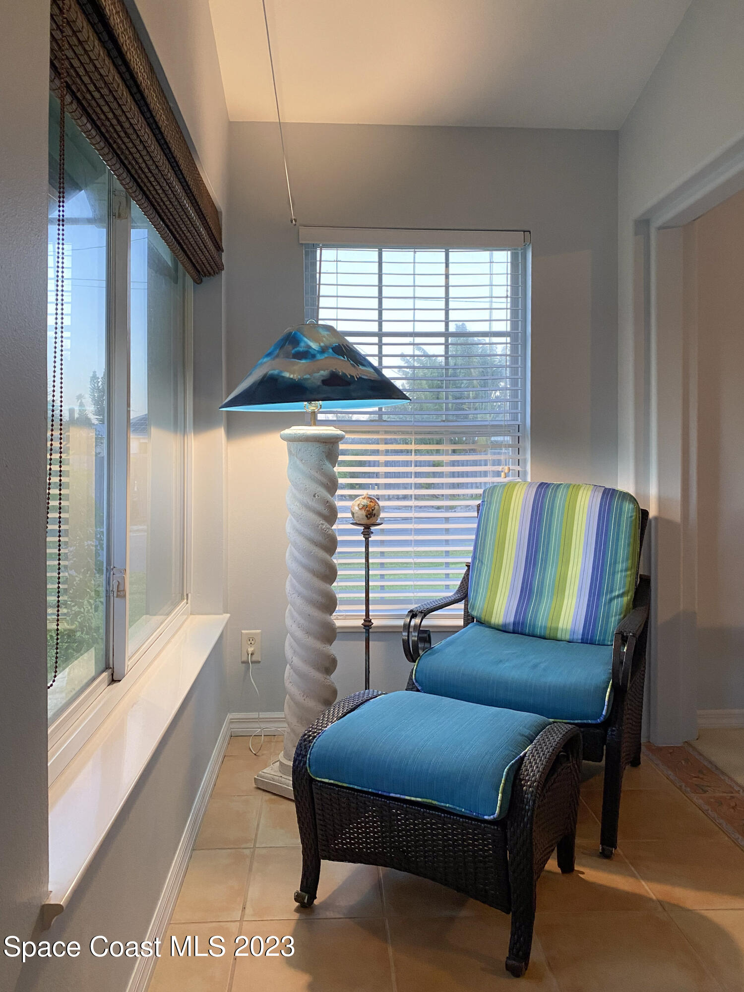 5080 Seiler Street Melbourne Beach, FL 32951 - Photo 14 of 34 a living room with furniture and a window
