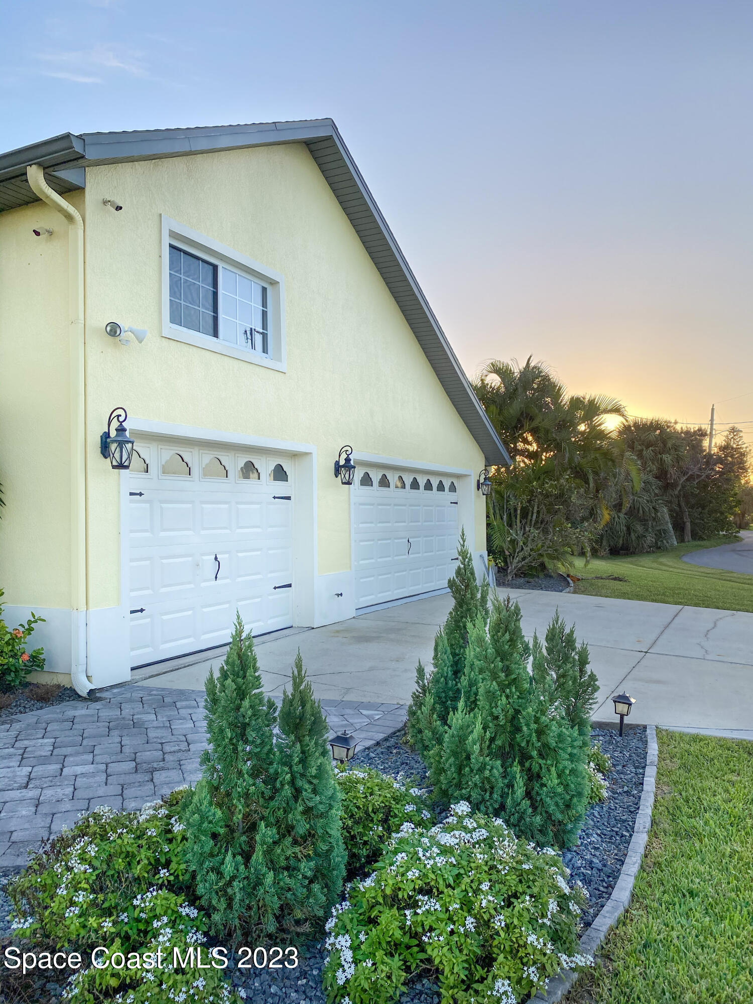 5080 Seiler Street Melbourne Beach, FL 32951 - Photo 3 of 34 a view of a house with a yard