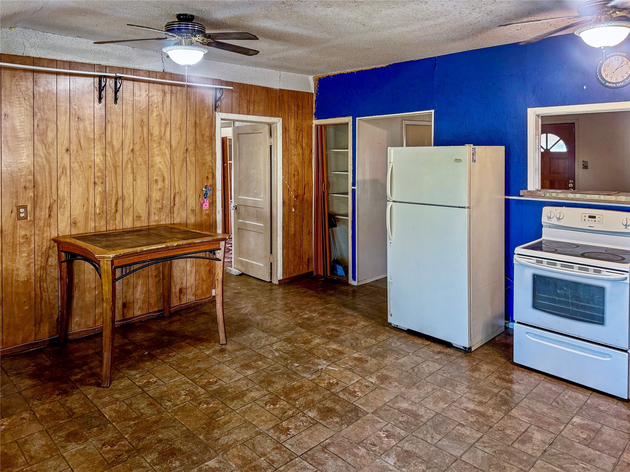4672 Rakowitz Road Adkins, TX 78101 - Photo 11 of 38 a view of room with furniture and a refrigerator