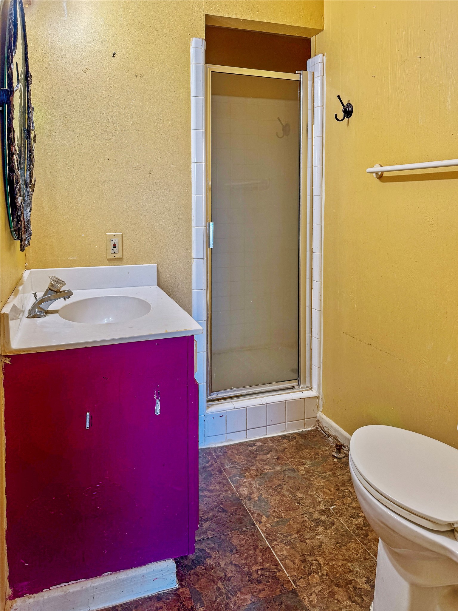 4672 Rakowitz Road Adkins, TX 78101 - Photo 26 of 38 a bathroom with a sink a mirror and a toilet