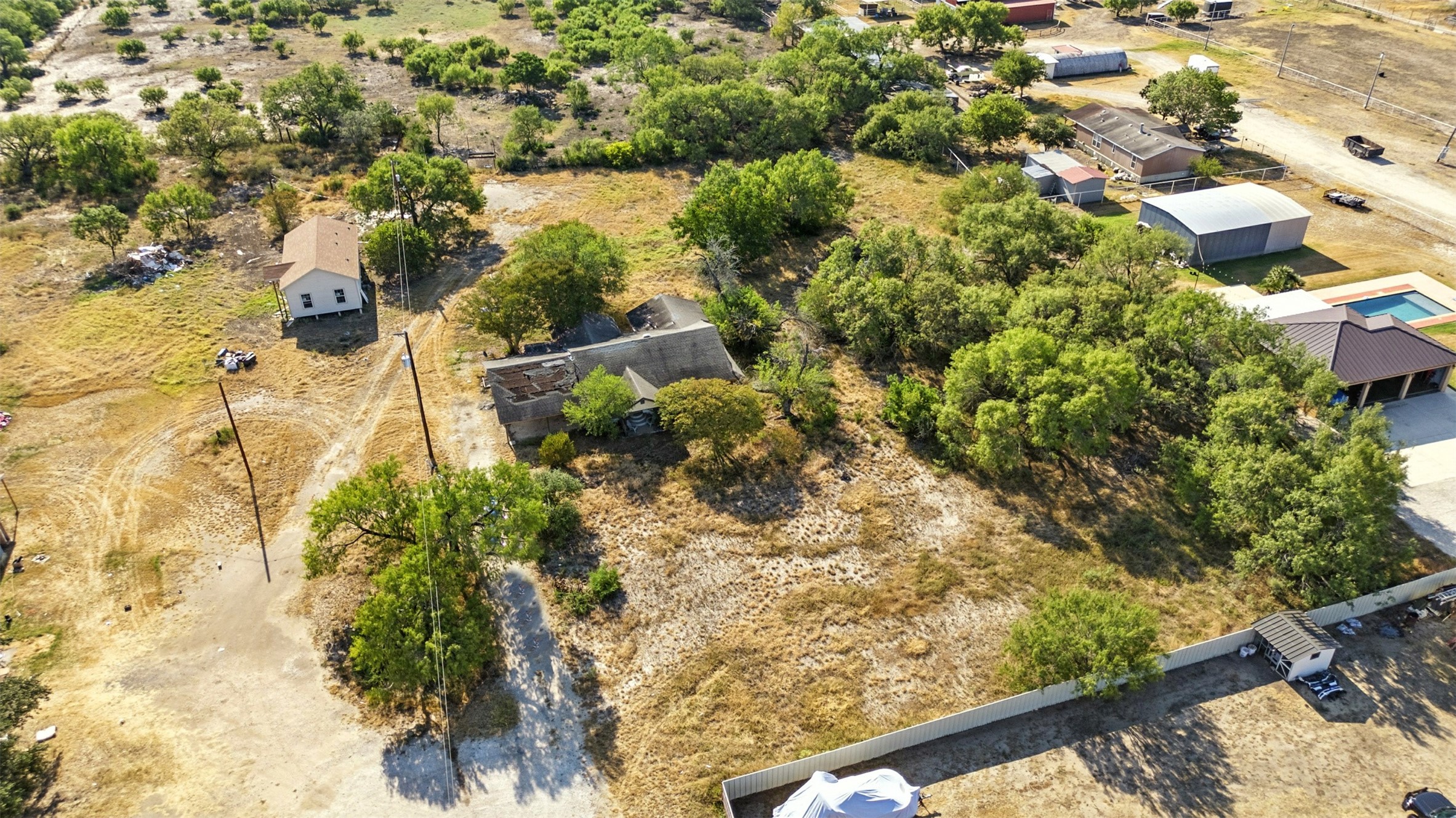 4672 Rakowitz Road Adkins, TX 78101 - Photo 32 of 38 a view of a yard with plants
