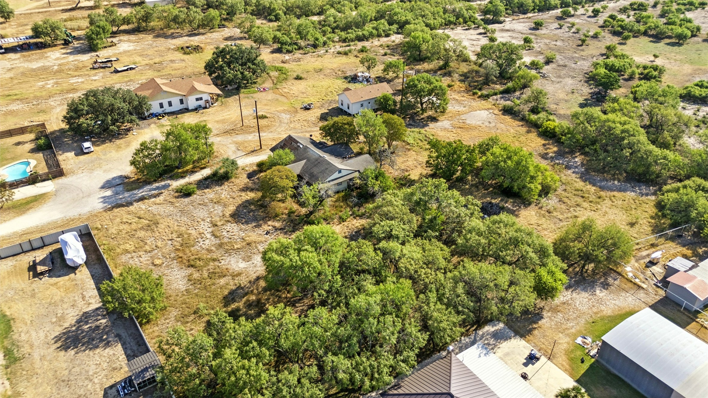 4672 Rakowitz Road Adkins, TX 78101 - Photo 37 of 38 an aerial view of residential houses with yard