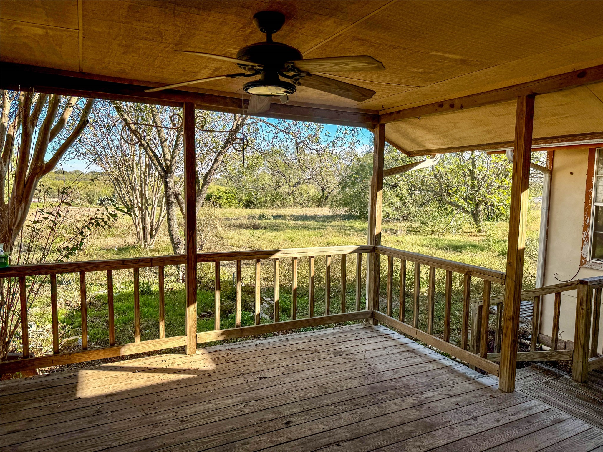 4672 Rakowitz Road Adkins, TX 78101 - Photo 7 of 38 a view of a balcony with wooden floor