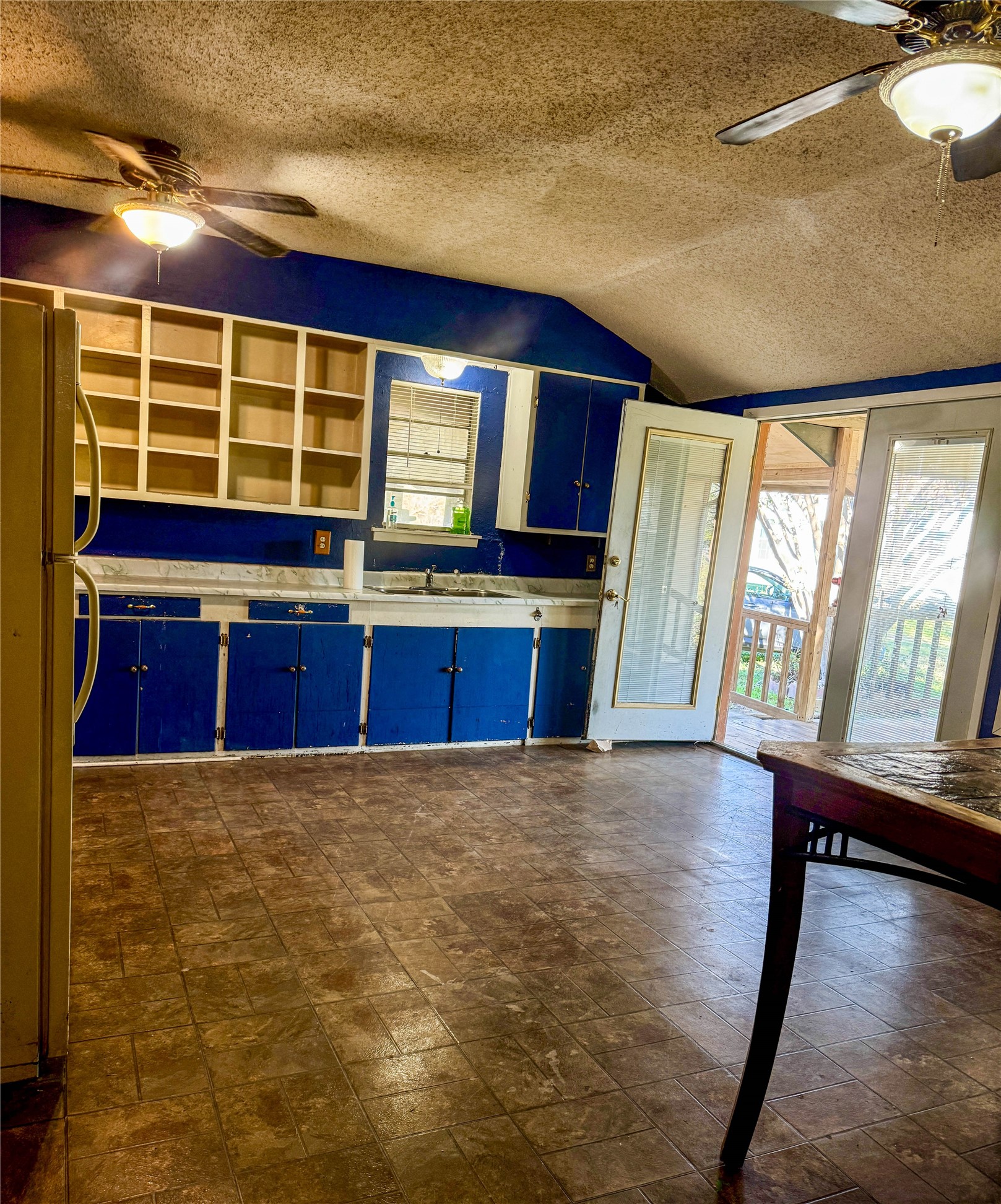4672 Rakowitz Road Adkins, TX 78101 - Photo 9 of 38 a view of kitchen with wooden floor and seating space