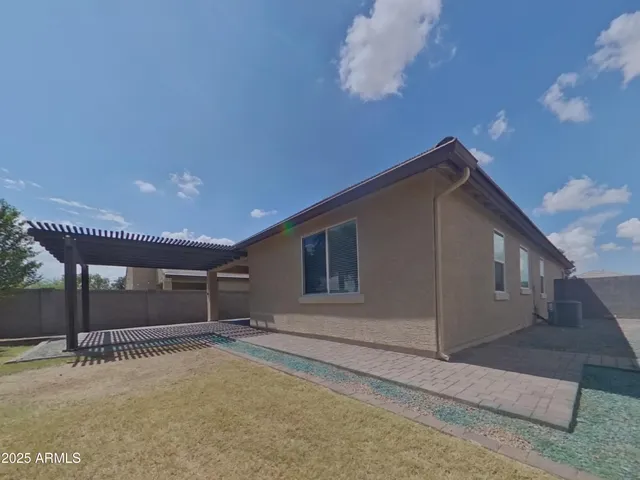 an empty room with closet area