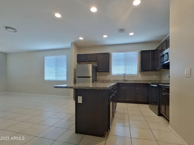 a picture of a bathroom with a shower
