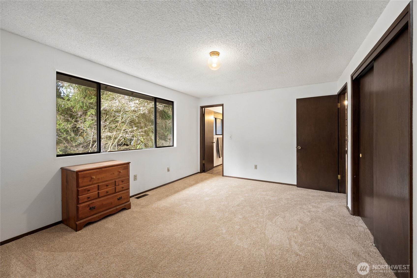 14606 60th Place West Edmonds, WA 98026 - Photo 16 of 27 a view of an empty room with a window