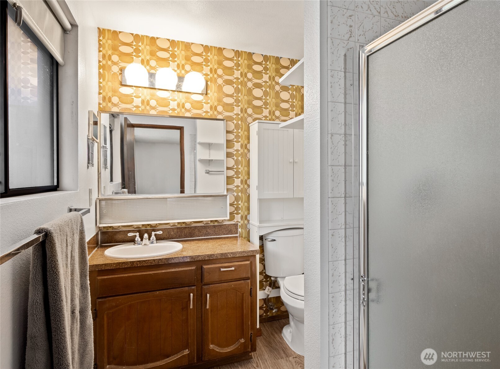 14606 60th Place West Edmonds, WA 98026 - Photo 17 of 27 a bathroom with a sink and a mirror