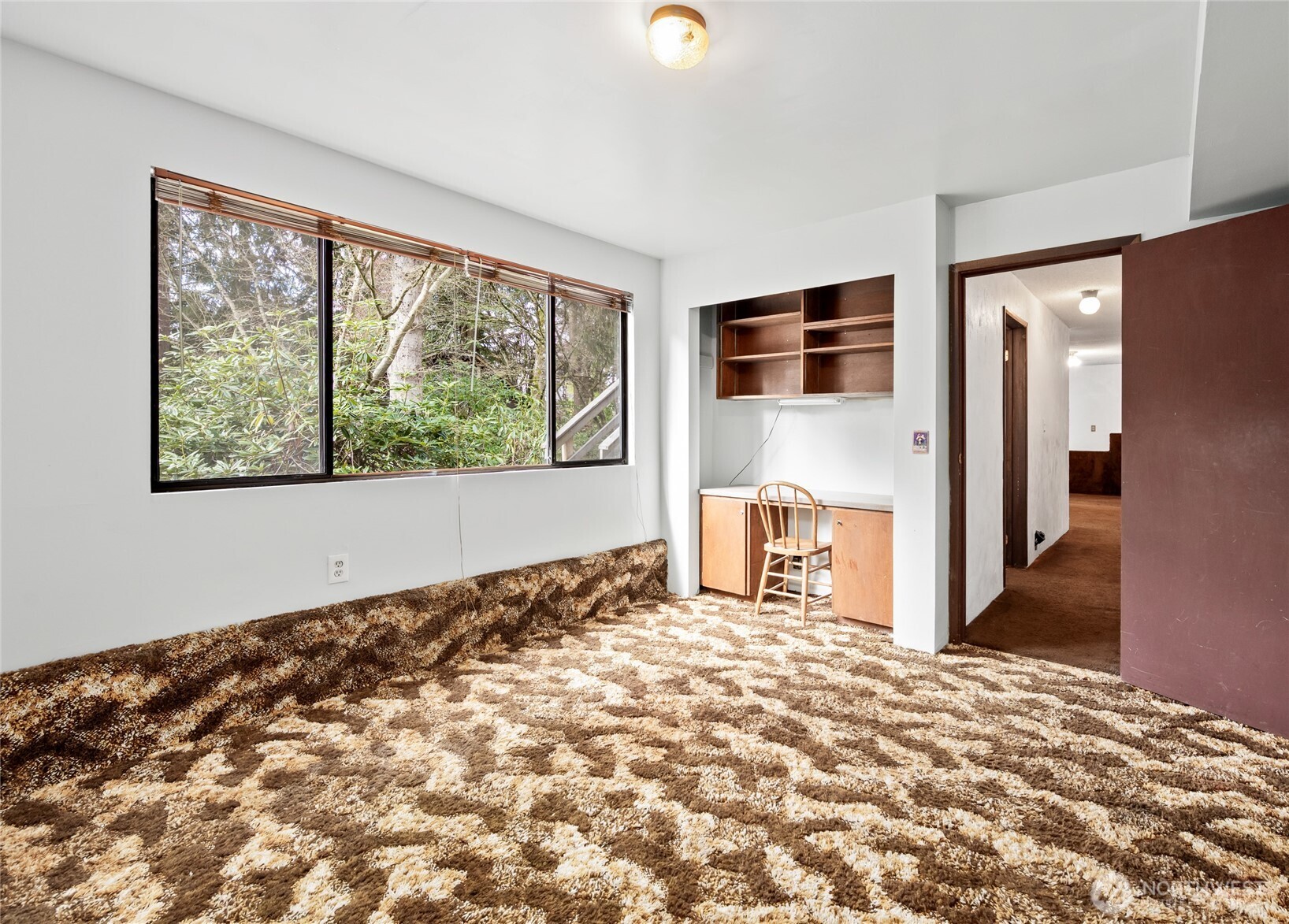 14606 60th Place West Edmonds, WA 98026 - Photo 22 of 27 a view of a livingroom with wooden floor and a large window