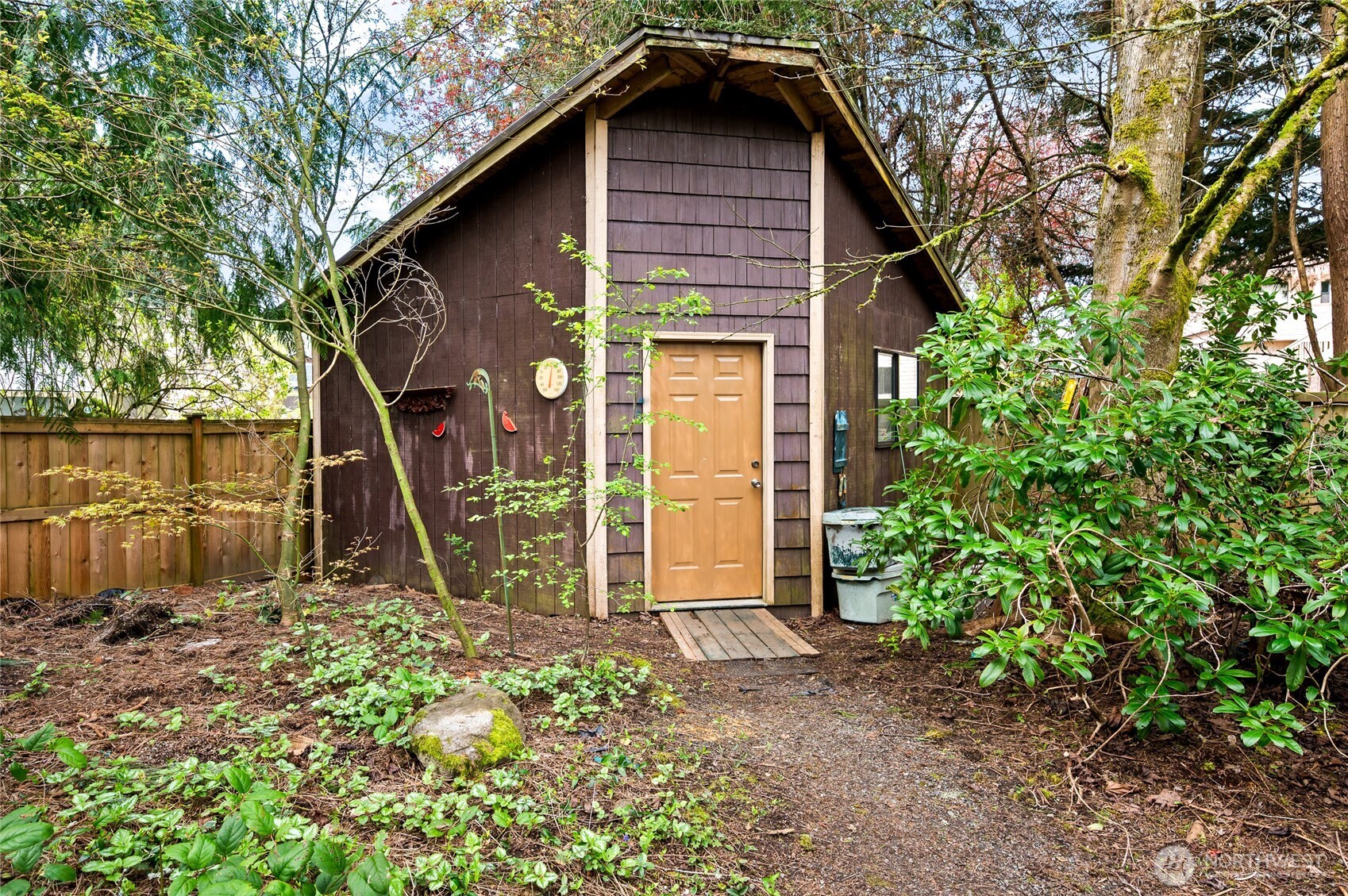 14606 60th Place West Edmonds, WA 98026 - Photo 24 of 27 a view of a house with a yard