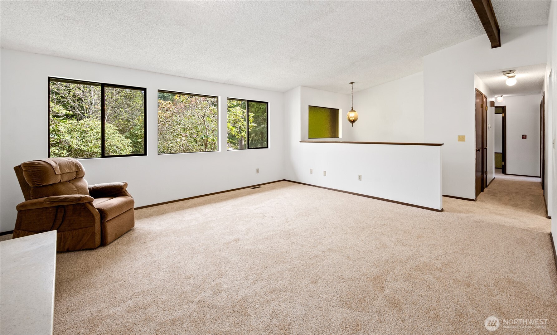 14606 60th Place West Edmonds, WA 98026 - Photo 6 of 27 a view of livingroom with furniture and windows