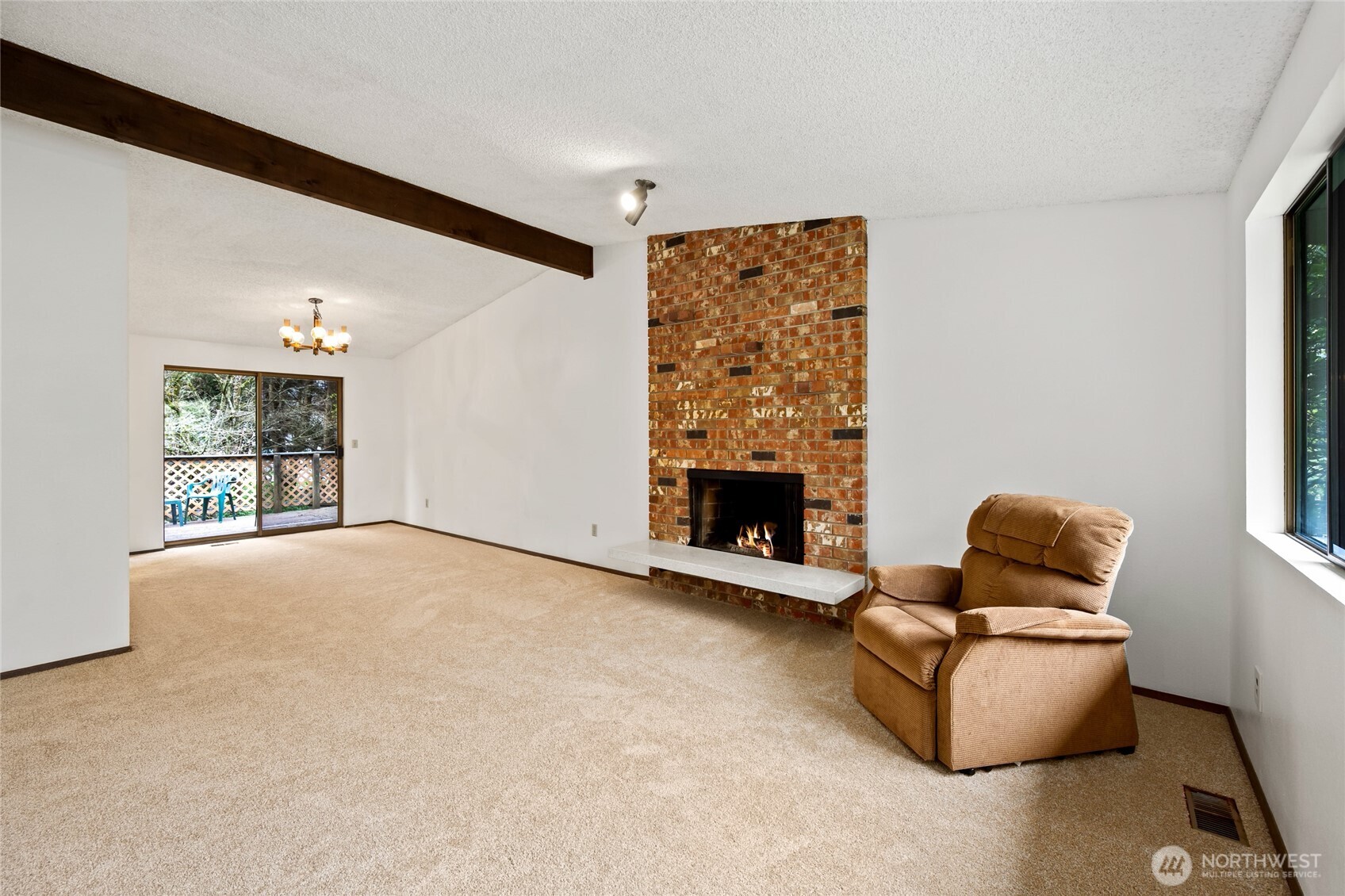 14606 60th Place West Edmonds, WA 98026 - Photo 8 of 27 a living room with furniture and a fireplace