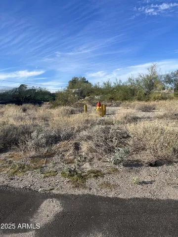 a view of a road with an ocean view