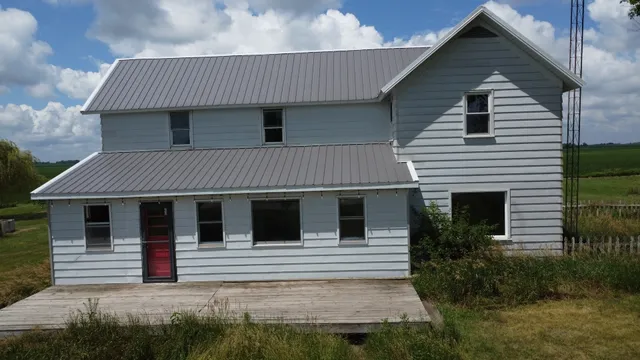 a house that has a window in front of it