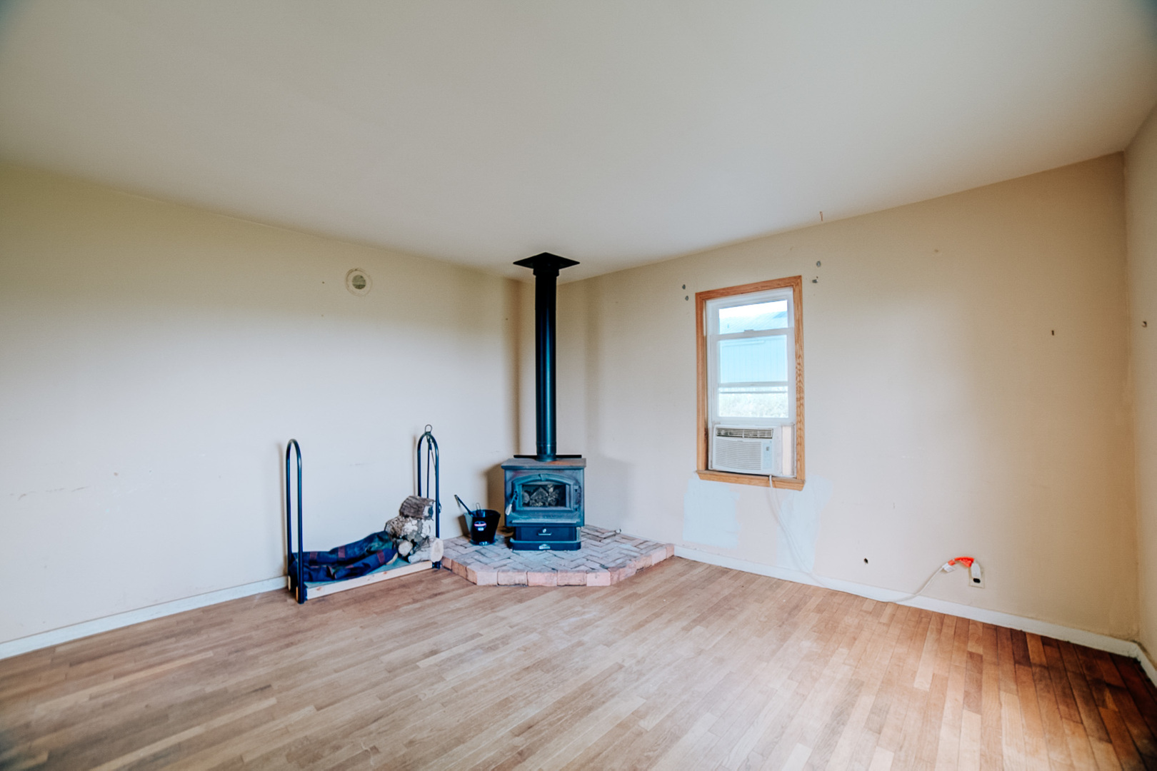 2371 North 3100 East Road Donovan, IL 60931 - Photo 16 of 45 a view of empty room with wooden floor and fan