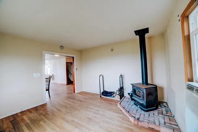 a view of an empty room and window