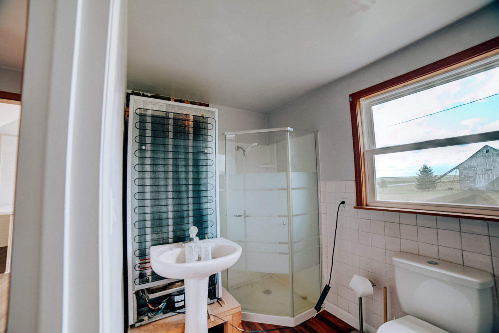 2371 North 3100 East Road Donovan, IL 60931 - Photo 26 of 45 a bathroom with a sink toilet and shower