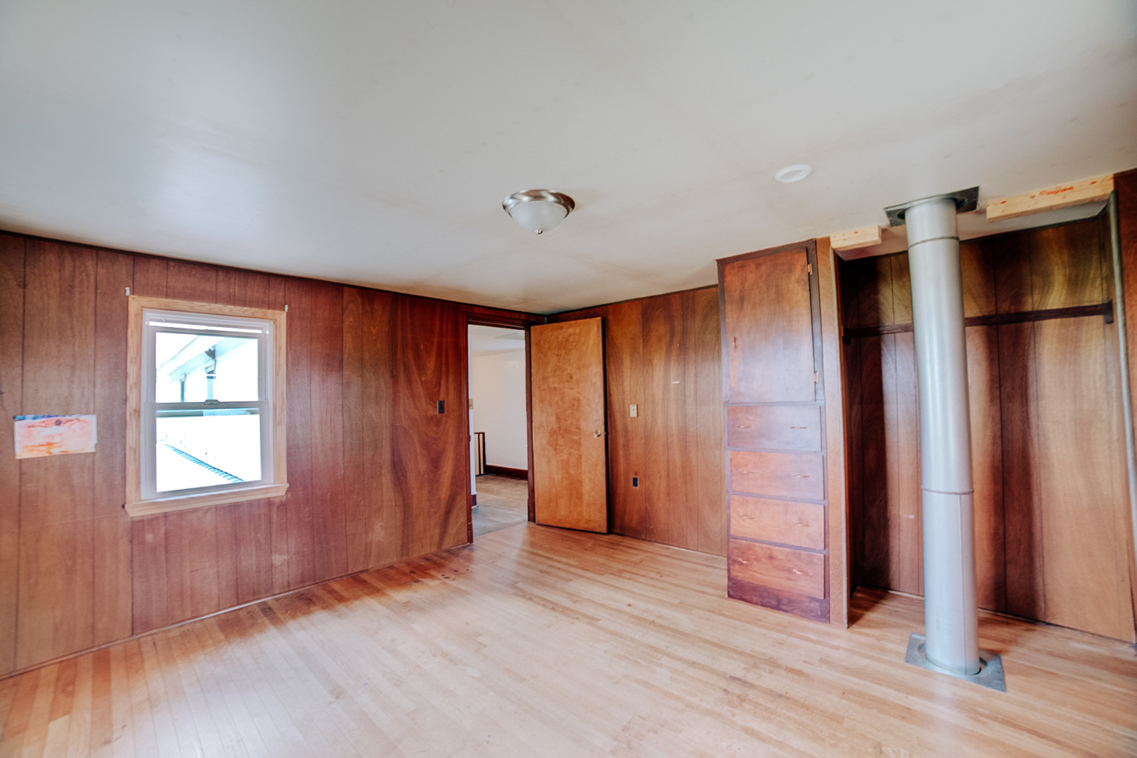 2371 North 3100 East Road Donovan, IL 60931 - Photo 40 of 45 an empty room with wooden floor and windows