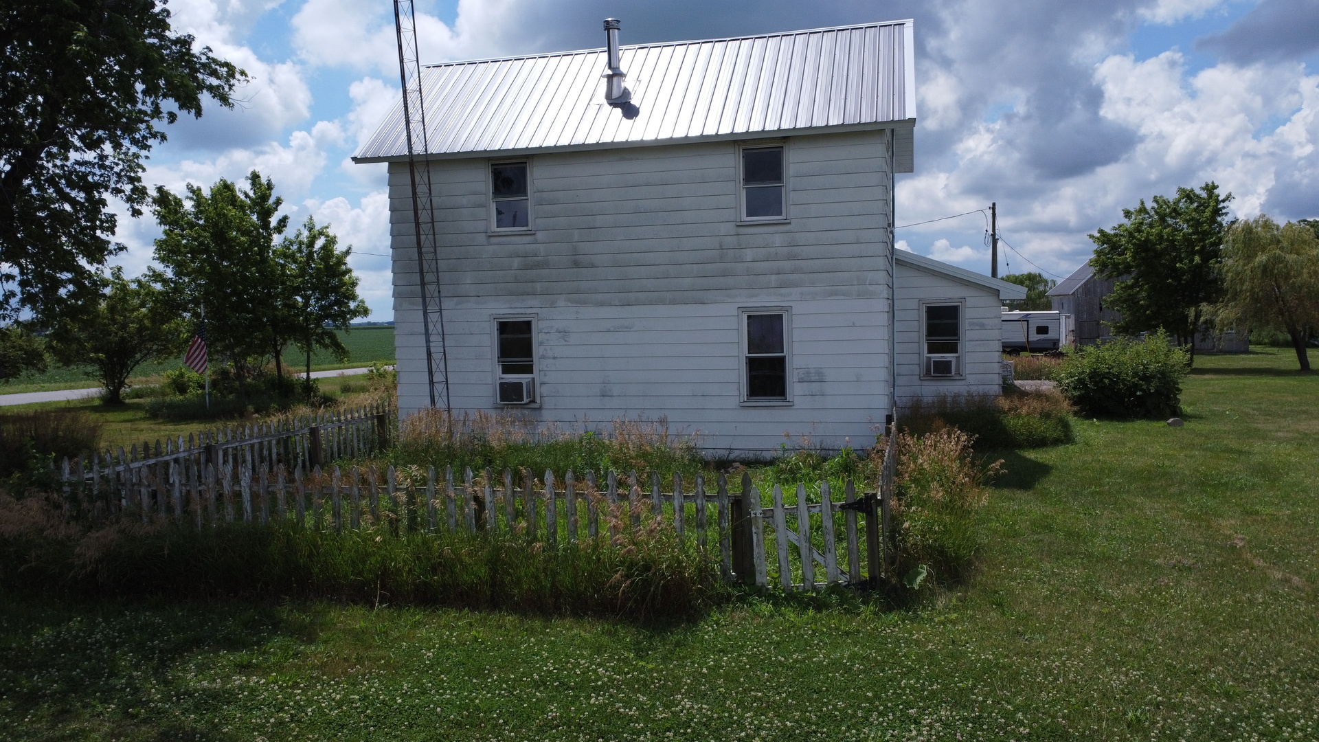 2371 North 3100 East Road Donovan, IL 60931 - Photo 6 of 45 a front view of a house with a yard