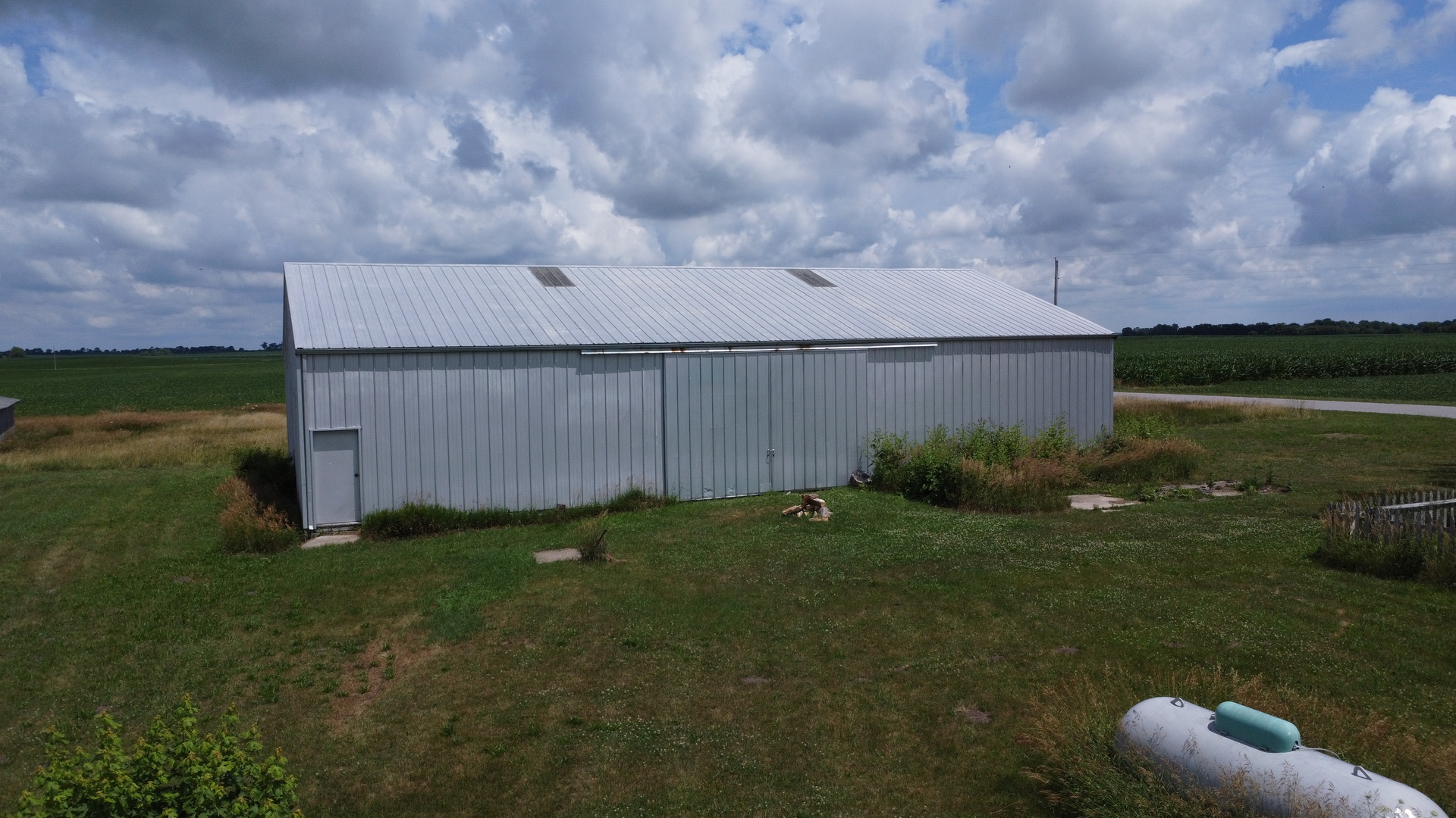 2371 North 3100 East Road Donovan, IL 60931 - Photo 10 of 45 a backyard of a house with lots of green space and garden view