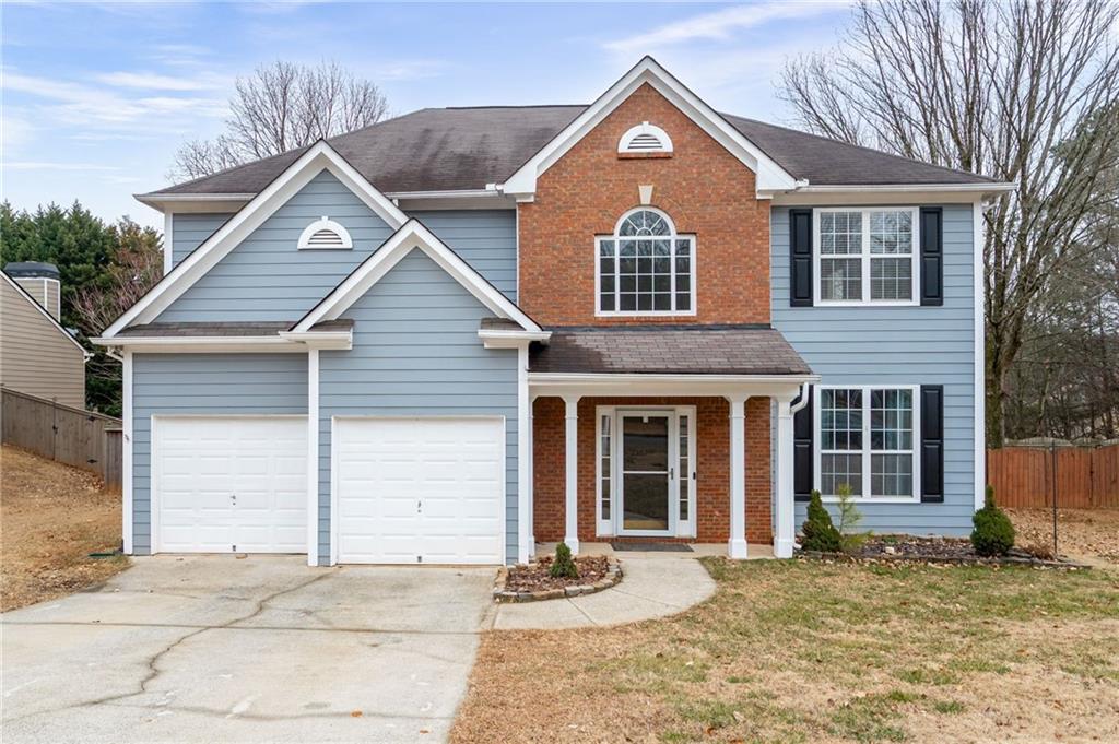 4510 Howell Farms Road Northwest Acworth, GA 30101 - Photo 1 of 1 a front view of a house with a yard