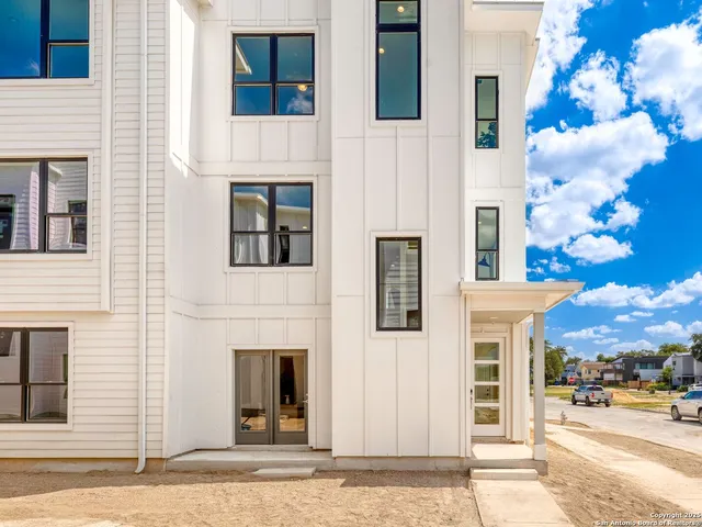 a view of a building with a street