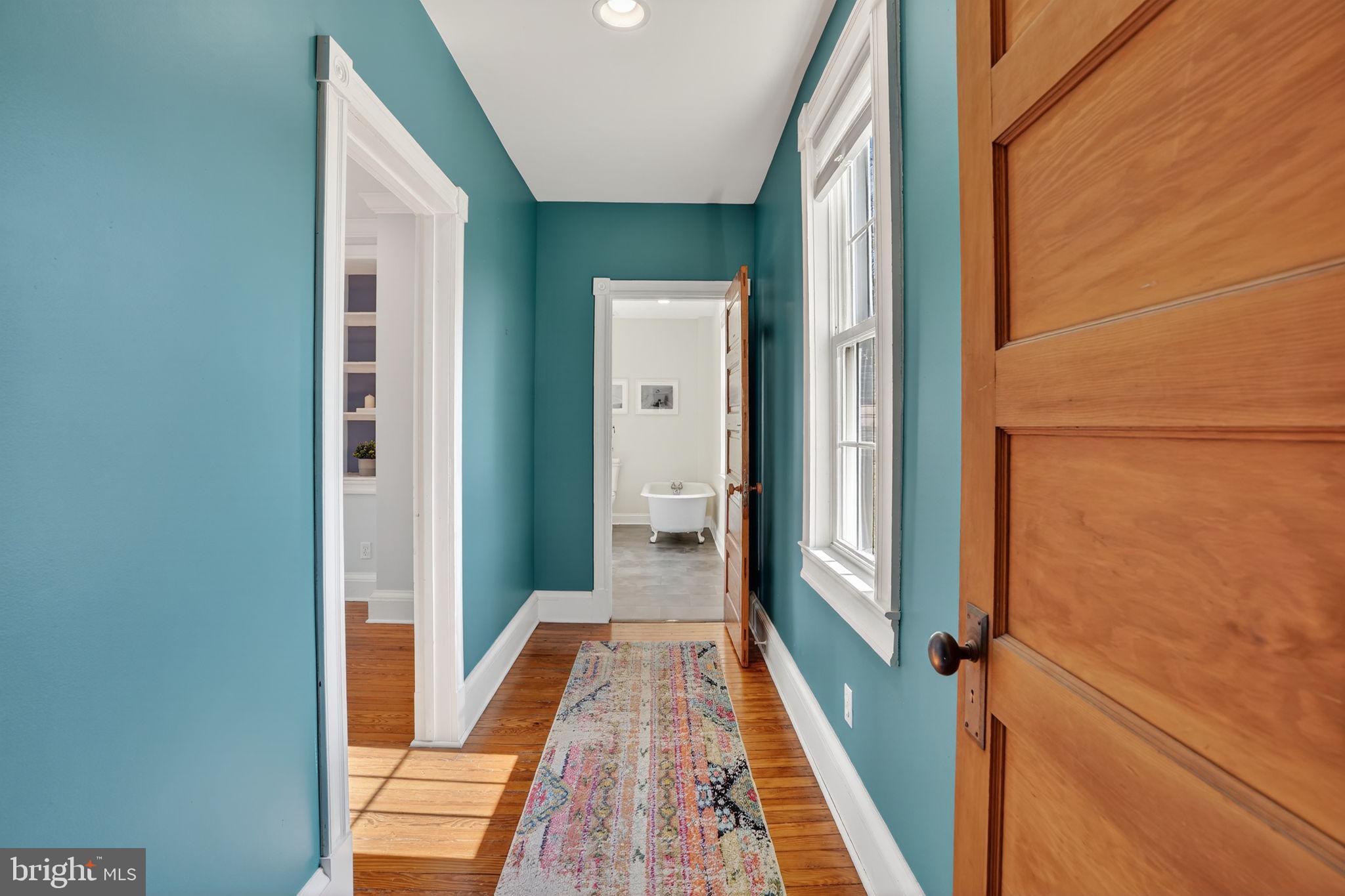 1007 Roland Heights Avenue Baltimore, MD 21211 - Photo 20 of 78 a view of a bathroom from the hallway