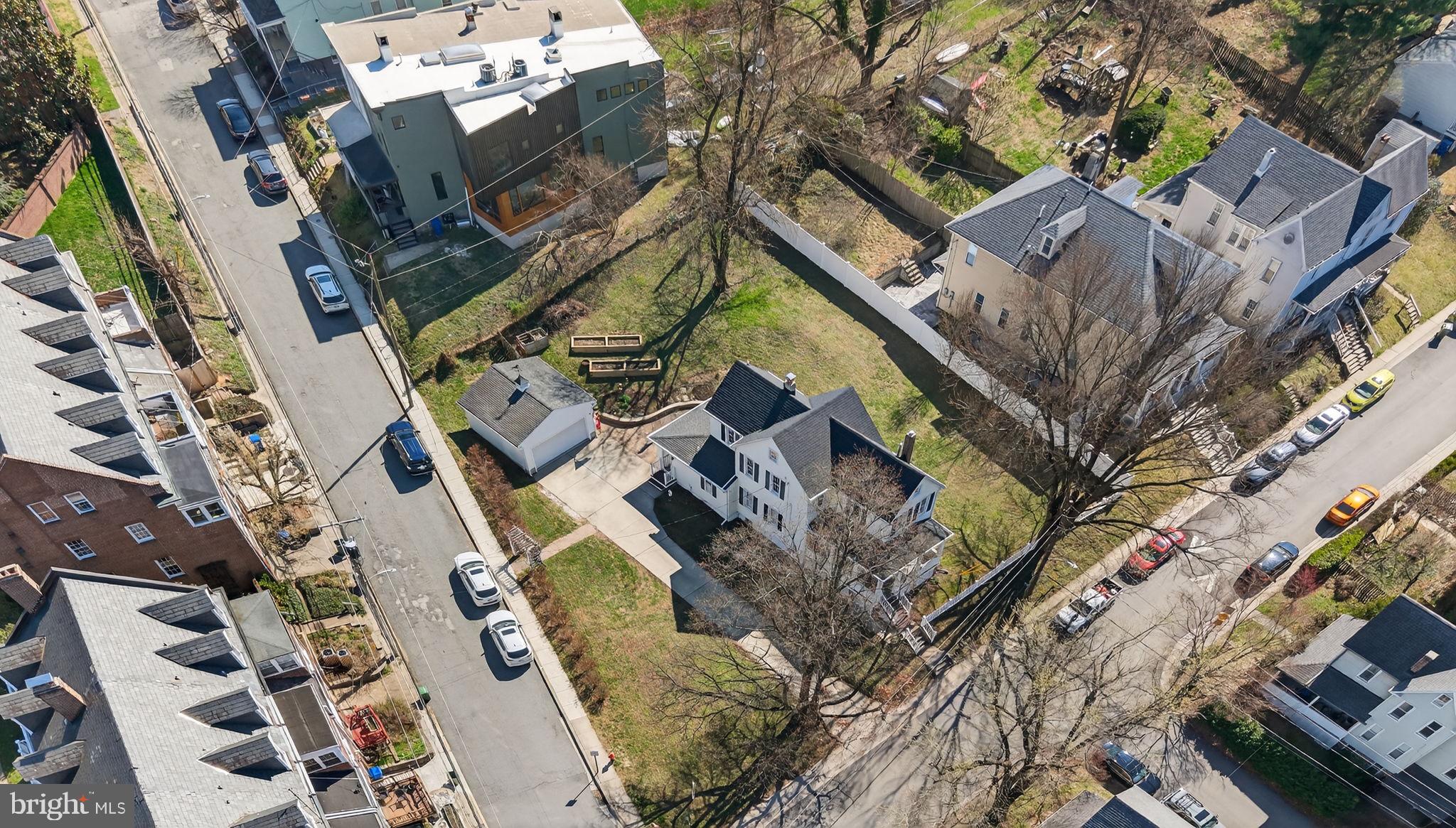 1007 Roland Heights Avenue Baltimore, MD 21211 - Photo 2 of 78 Private driveway 2 car garage + TRIPLE lot!