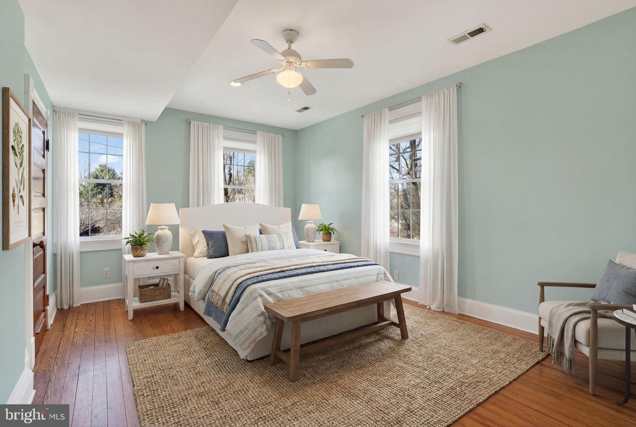 1007 Roland Heights Avenue Baltimore, MD 21211 - Photo 21 of 78 a bed room with a bed and a window