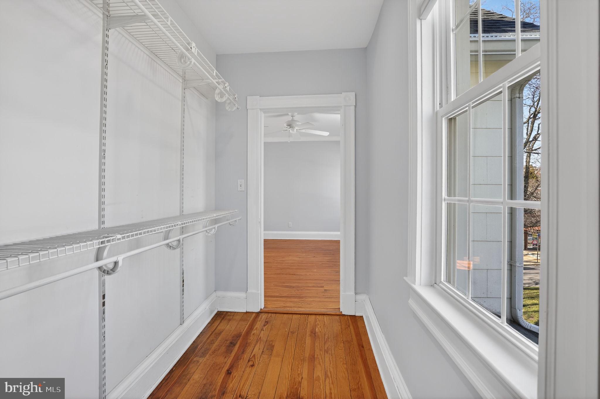 1007 Roland Heights Avenue Baltimore, MD 21211 - Photo 22 of 78 a view of front door with wooden floor