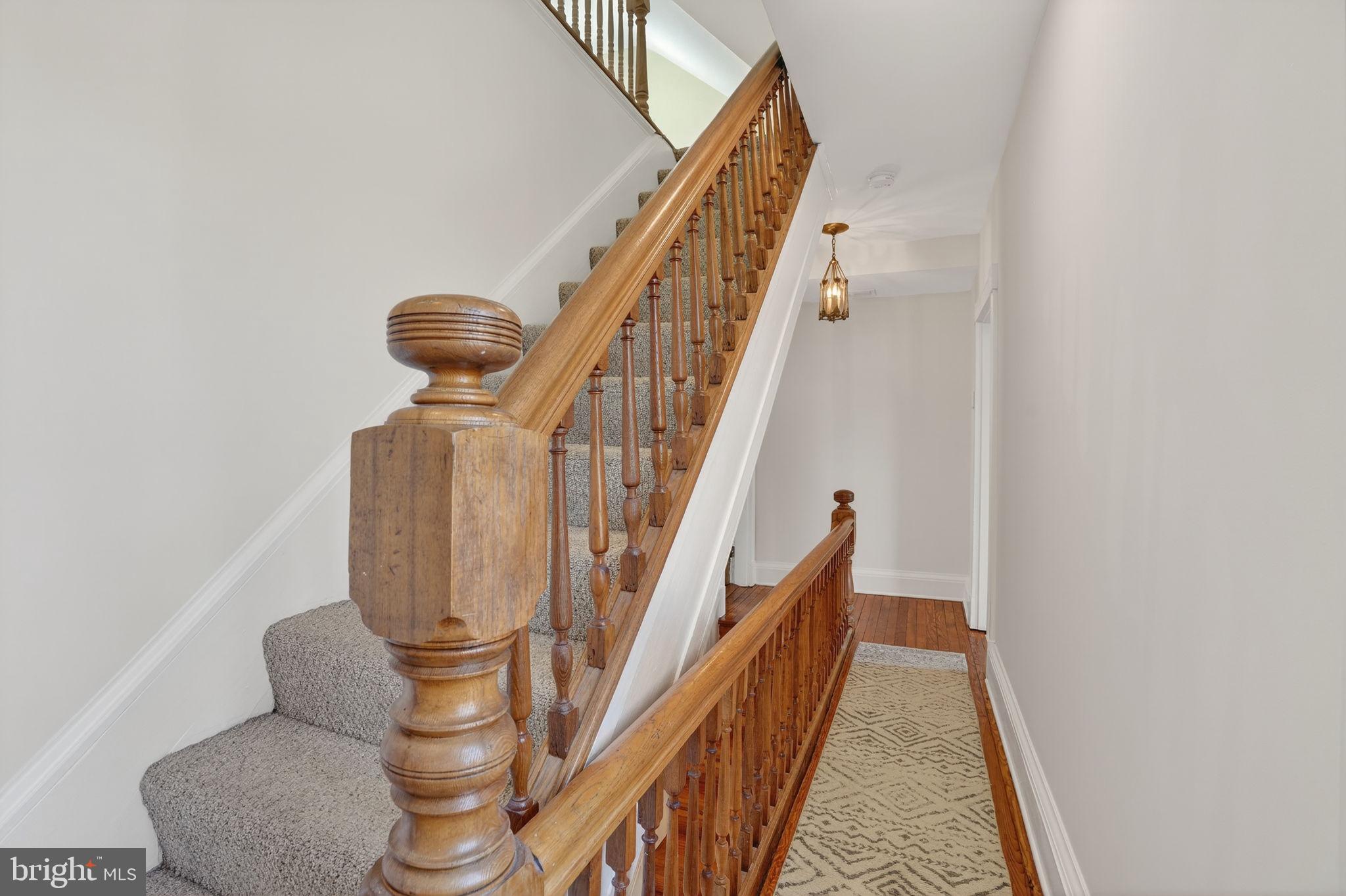 1007 Roland Heights Avenue Baltimore, MD 21211 - Photo 24 of 78 a view of entryway and hall with wooden floor