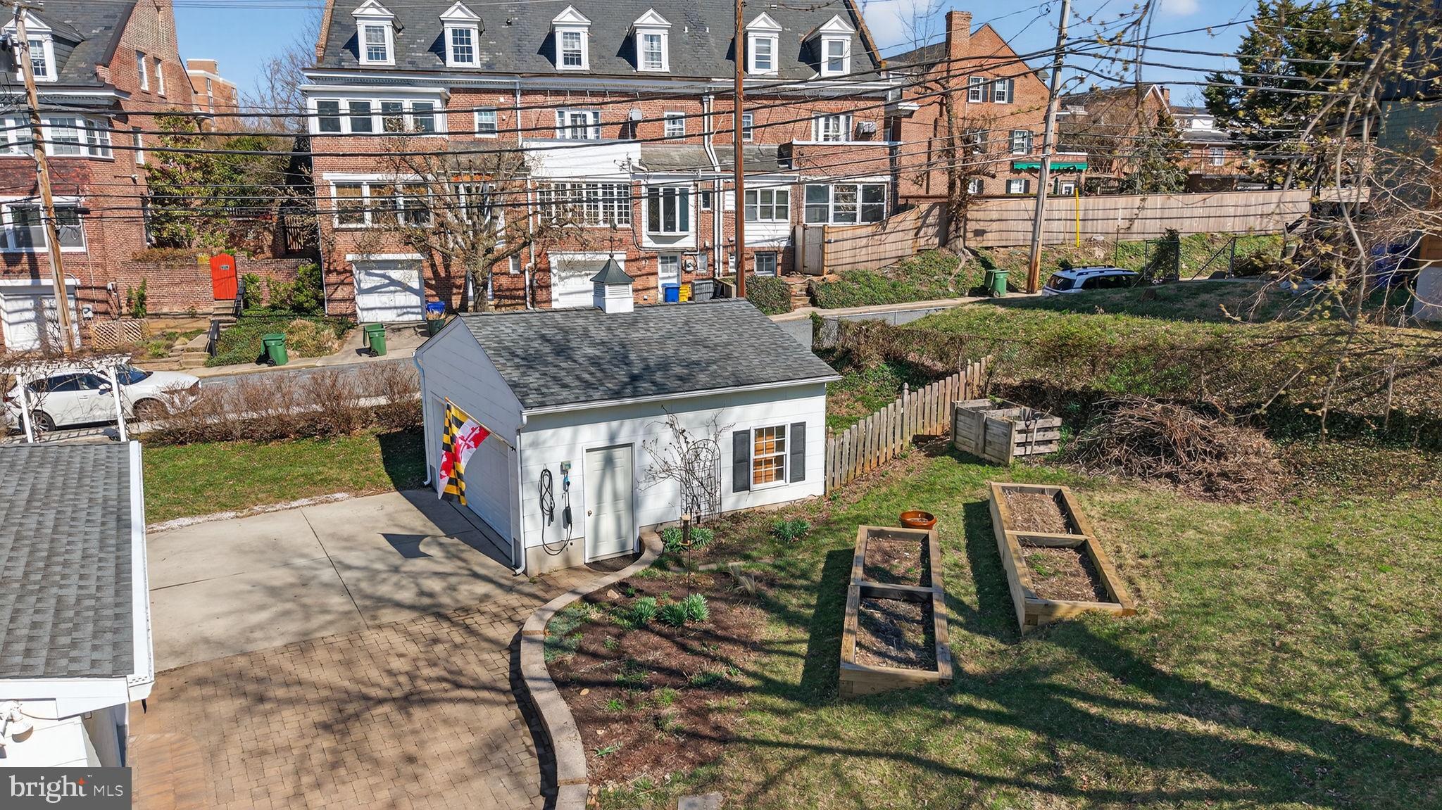 1007 Roland Heights Avenue Baltimore, MD 21211 - Photo 30 of 78 an aerial view of a house