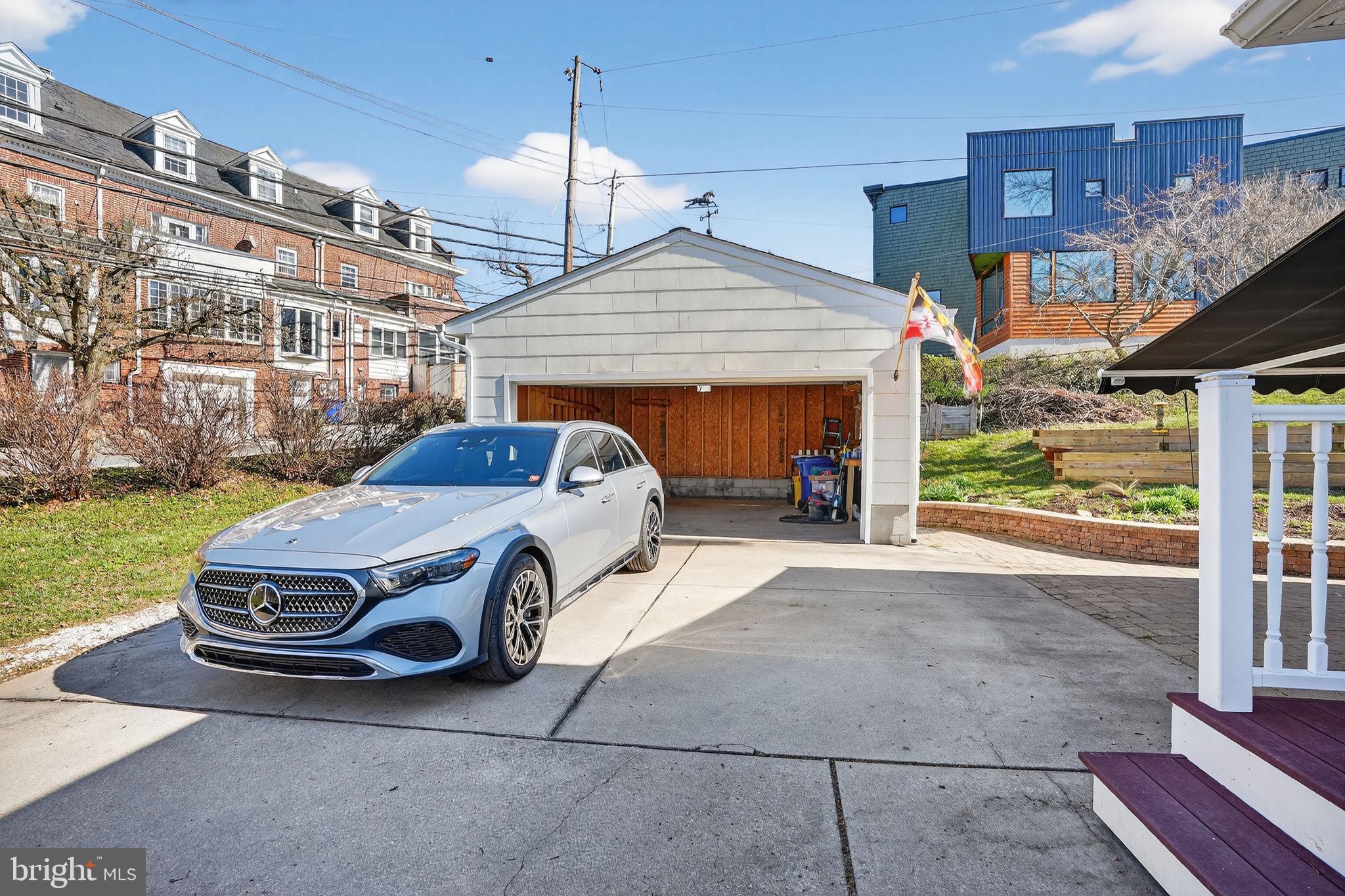 1007 Roland Heights Avenue Baltimore, MD 21211 - Photo 31 of 78 a car parked in front of a building