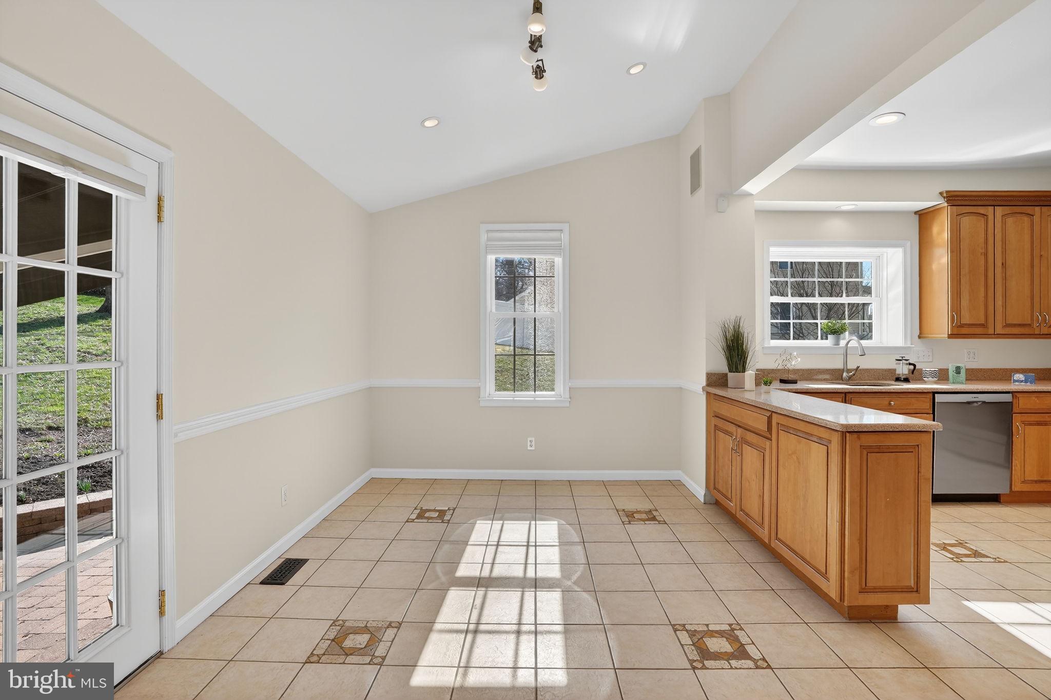 1007 Roland Heights Avenue Baltimore, MD 21211 - Photo 36 of 78 a view of a kitchen with windows