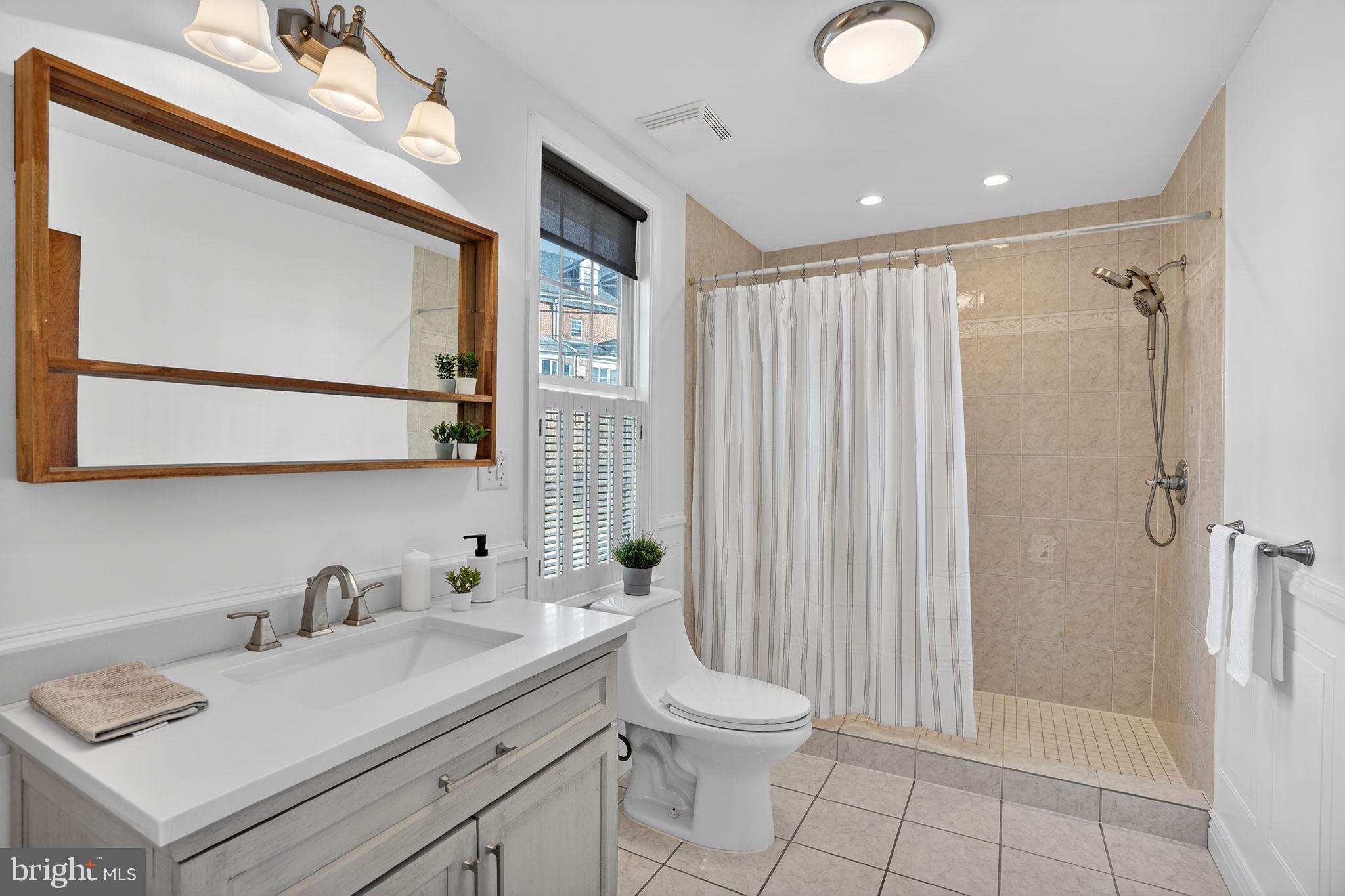 1007 Roland Heights Avenue Baltimore, MD 21211 - Photo 43 of 78 1st floor full bath