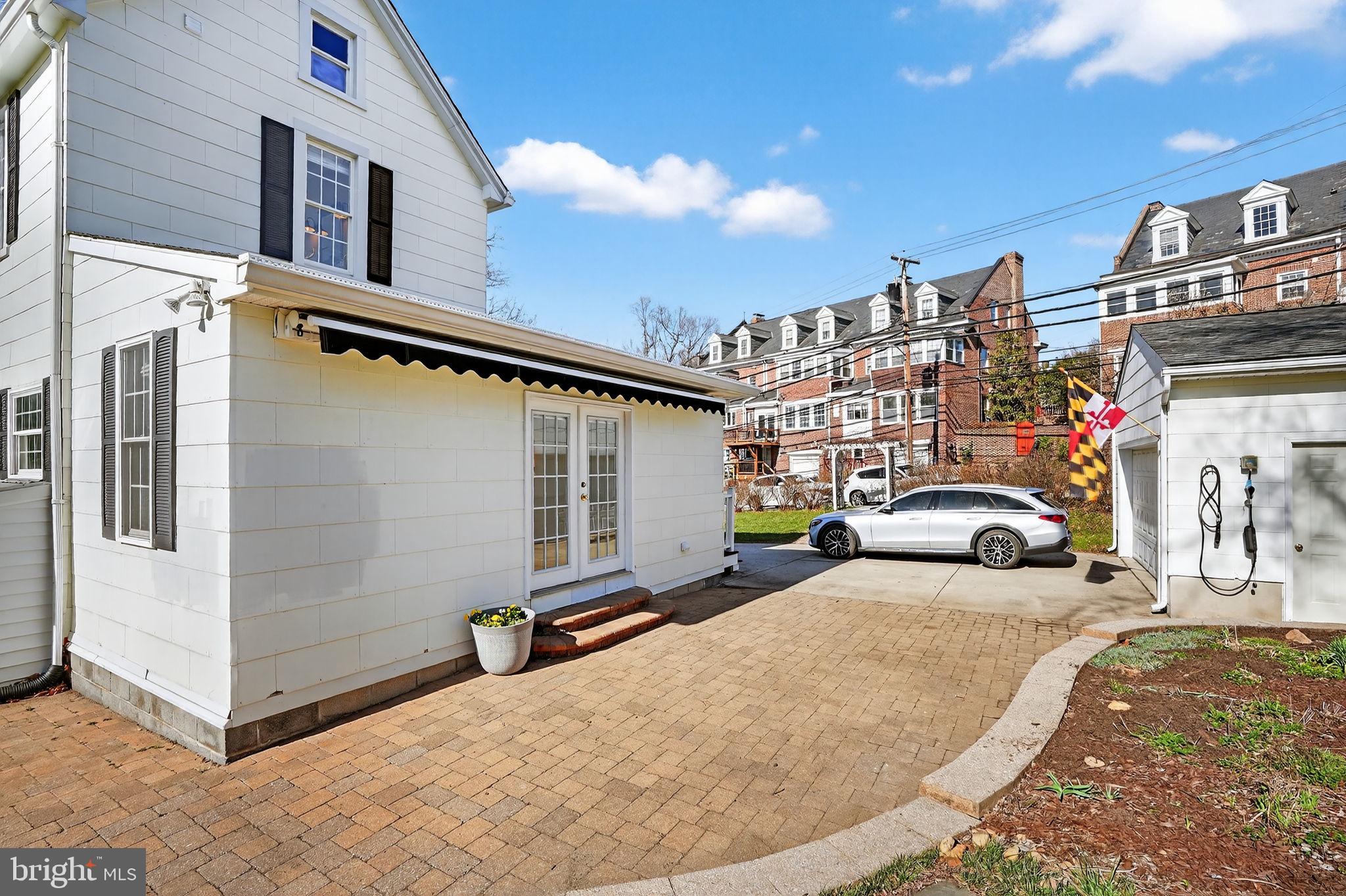 1007 Roland Heights Avenue Baltimore, MD 21211 - Photo 56 of 78 a view of a car park in front of a building