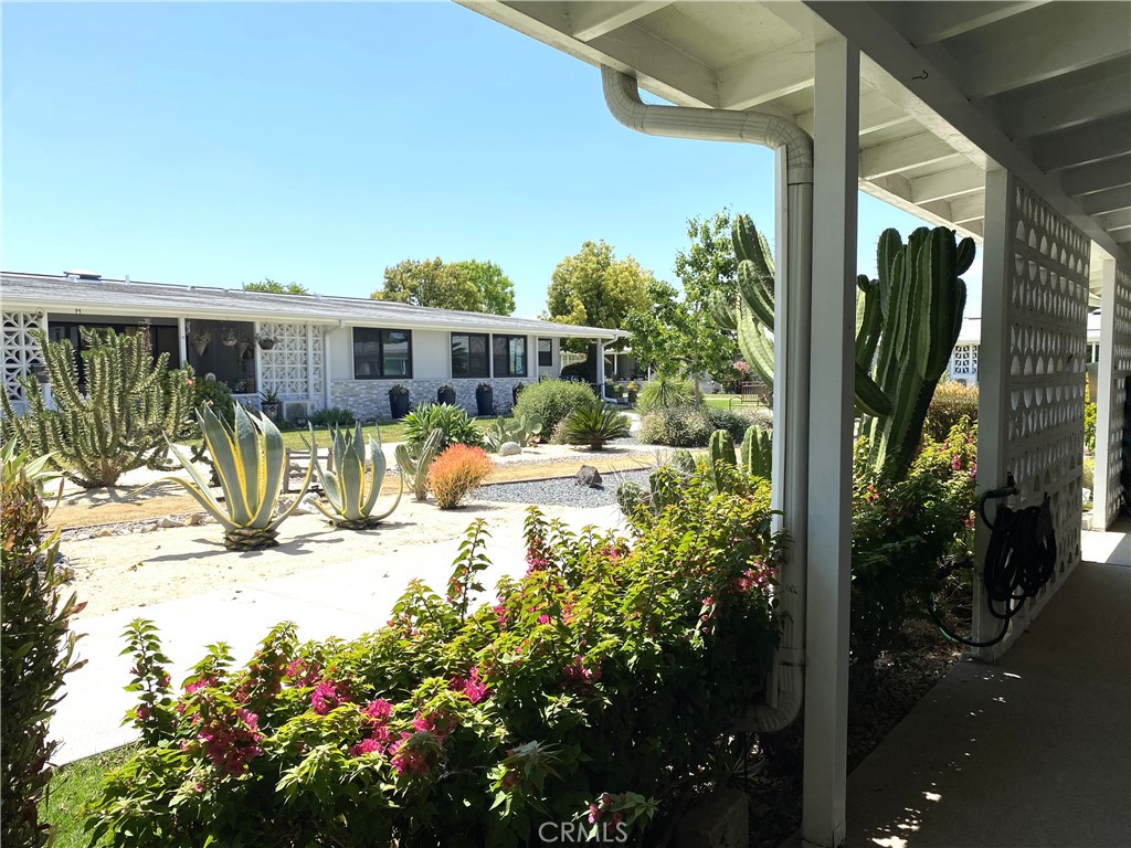 1681 Monterey Road Seal Beach, CA 90740 - Photo 3 of 23 a view of a house with backyard porch and sitting area