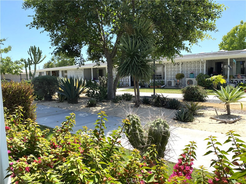 1681 Monterey Road Seal Beach, CA 90740 - Photo 5 of 23 a view of a house with a yard