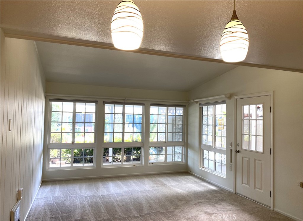 1681 Monterey Road Seal Beach, CA 90740 - Photo 7 of 23 a view of an empty room and window