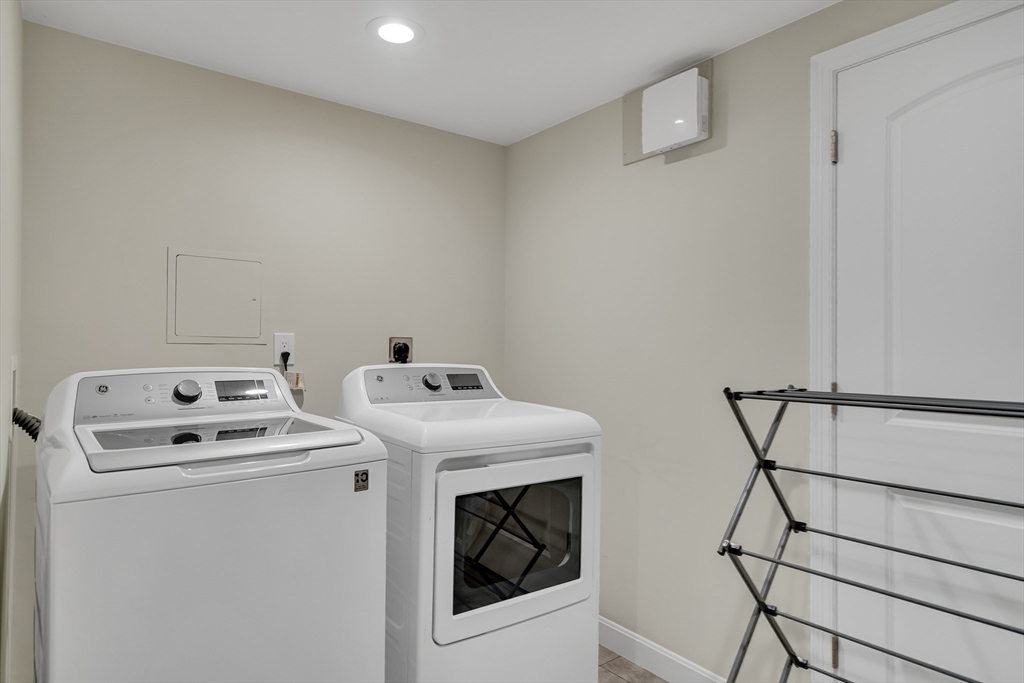 45 Bates Road, Unit 45 Watertown, MA 02472 - Photo 14 of 19 a utility room with dryer and washer