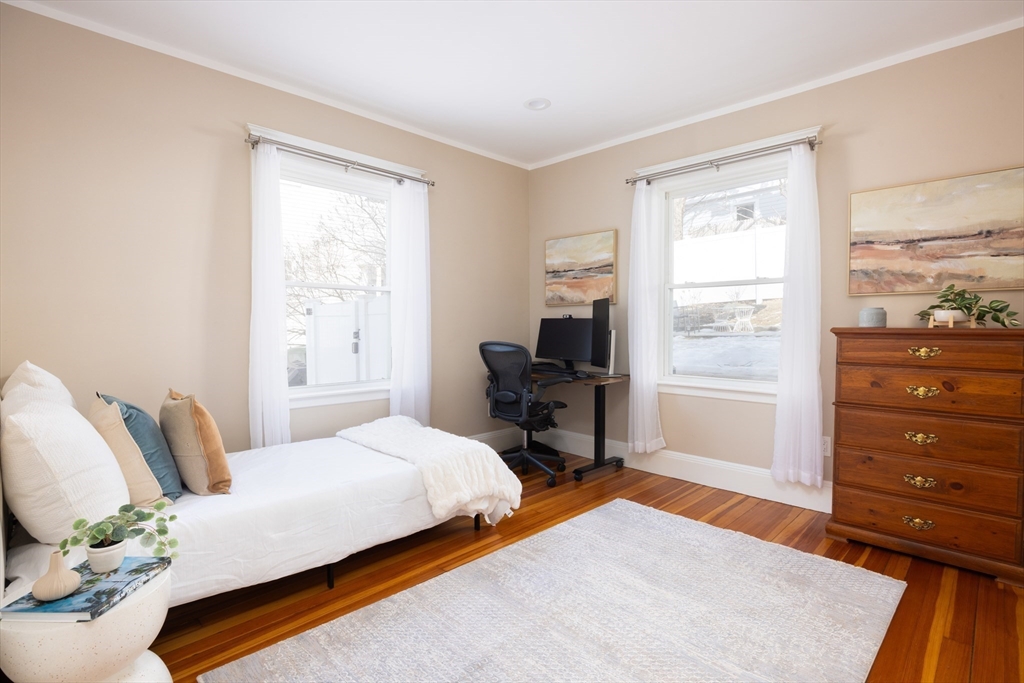 45 Bates Road, Unit 45 Watertown, MA 02472 - Photo 8 of 19 a bedroom with a bed and a window