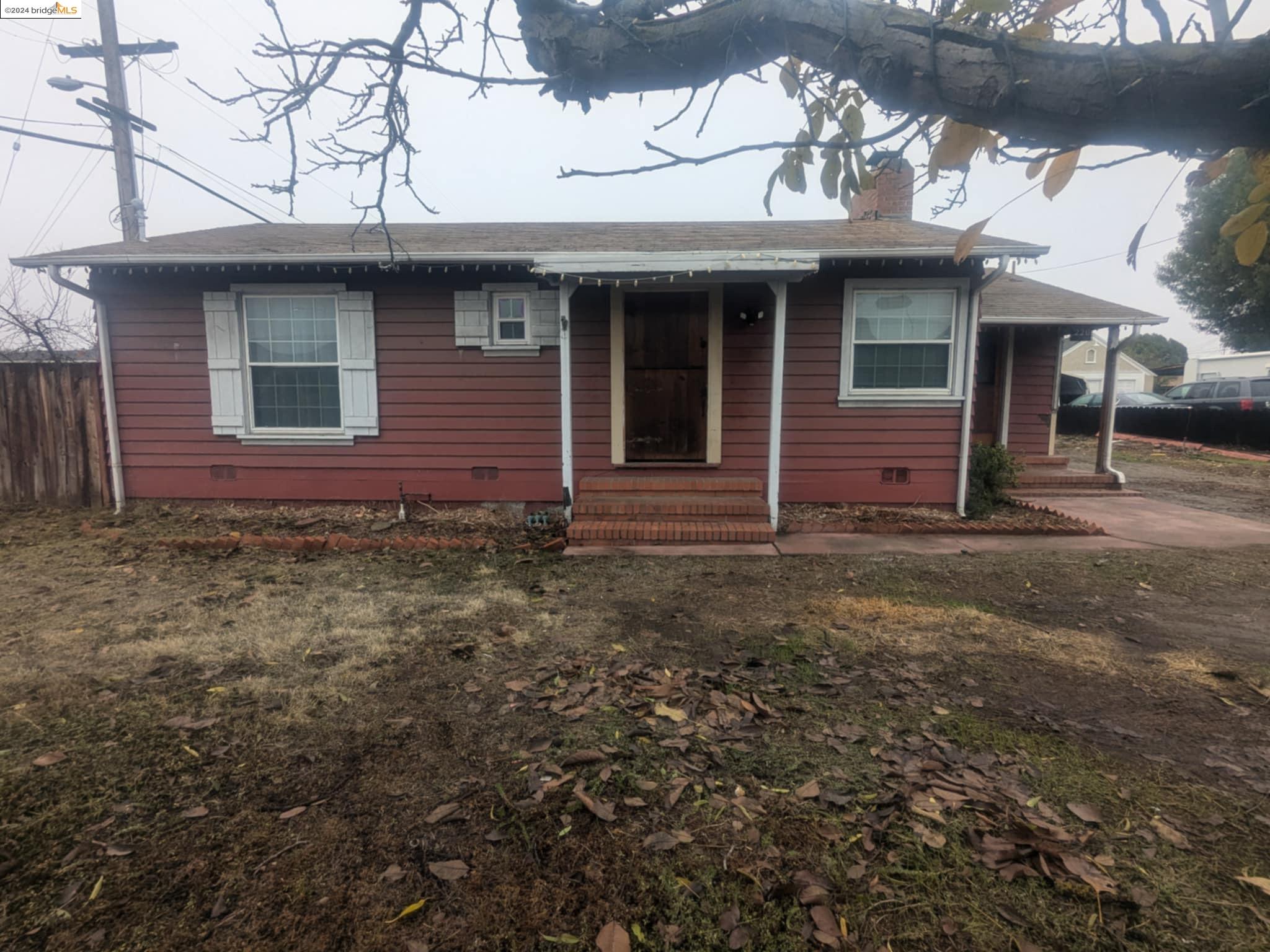 220 East Tregallas Road Antioch, CA 94509 - Photo 1 of 1 a front view of a house with a garden